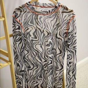 Unbranded mesh shirt with orange stitching detail